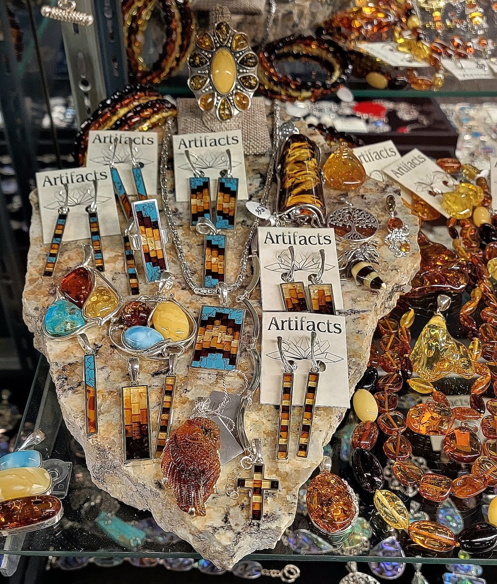 Various jewelry in fall colors - orange, blue, gold.